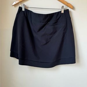 Annika black golf skirt
